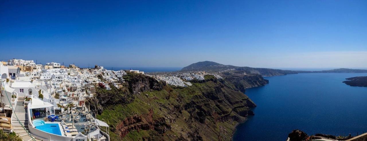 A clifftop infinity pool overlooking the caldera at Firostefani